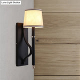 Minimalist Metallic Wall Sconce Light 1-Light Black/Flaxen For Bedroom - 16/18.5 Cone Mount Lighting