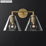 Minimalistic Brass Wall Sconce With Clear Glass For Bedside Lighting
