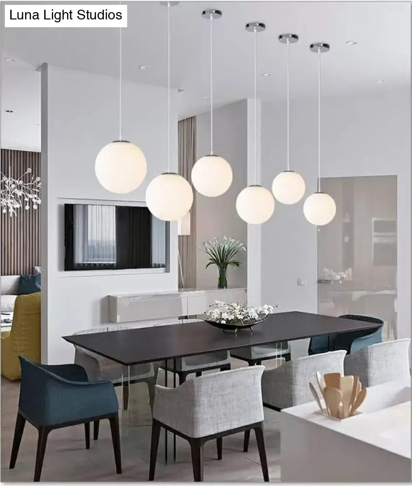 Modern 1 Light Glass Ball Pendant For Clothing Store Ceiling Simple & White
