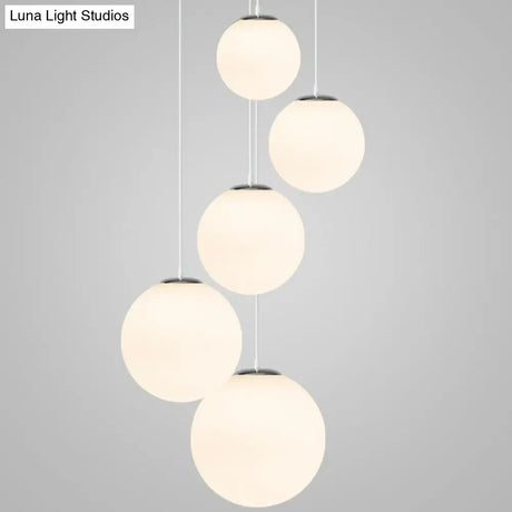 Modern 1 Light Glass Ball Pendant For Clothing Store Ceiling Simple & White