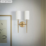 Modern 2-Light Metal Brass Wall Lamp With Symmetric Cylinder Design Fabric Shade - Ideal For Bedroom