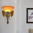 Modern Amber Glass Sconce With Gold Elephant Accent