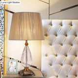 Modern Beige Table Lamp With Flared Wide Base And Fabric Shade