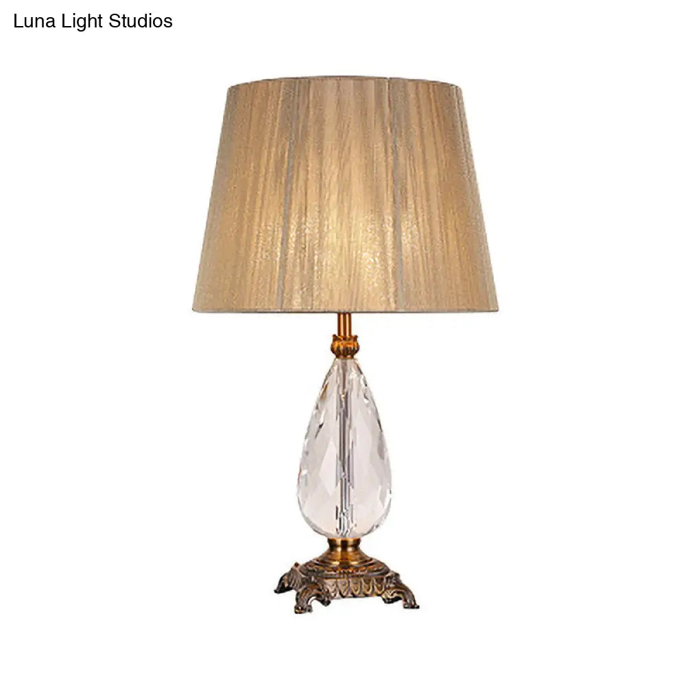 Modern Beige Table Lamp With Flared Wide Base And Fabric Shade