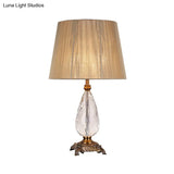 Modern Beige Table Lamp With Flared Wide Base And Fabric Shade