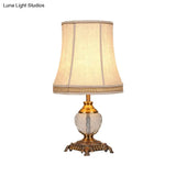 Modern Bell Fabric Table Lamp With Carved Bronze Metallic Base - Beige