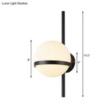 Modern Black/Gold Vertical Wall Sconce With Orbit Opal Glass Shade - 1 Head Metal Lamp 6/8 Width