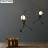 Modern Black Stickman Pendant Light Kit - Small Artistic Hanging Lamp With 1-Light Metal Ceiling
