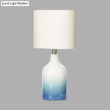 Modern Blue Ceramic Table Lamp - Urn Task Light With White Drum Shade
