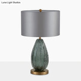 Modern Blue Seeded Glass Ellipse Night Lamp - Grey Table Light With Drum Fabric Shade (12/15 W)
