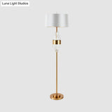 Modern Brass Finish Floor Lamp With Barrel Shade And Metal Base