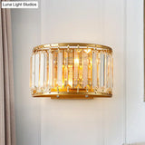 Modern Brass Wall Sconce With Drum-Shaped Clear Crystal Shade - 1 Light Living Room Lighting Fixture