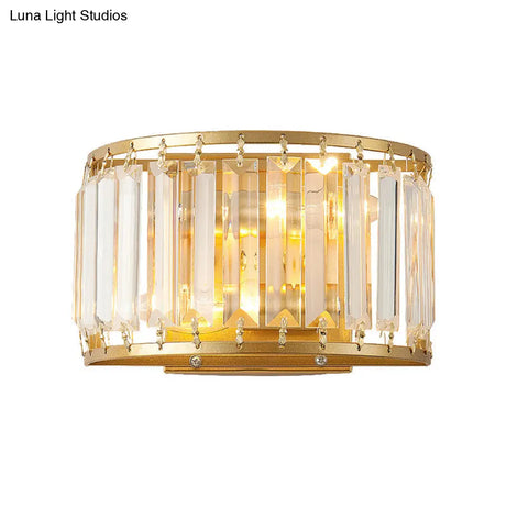 Modern Brass Wall Sconce With Drum-Shaped Clear Crystal Shade - 1 Light Living Room Lighting Fixture