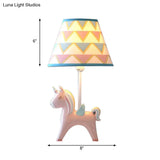 Modern Carousel Table Lamp With Tapered Shade - Resin Light For Kids Bedroom