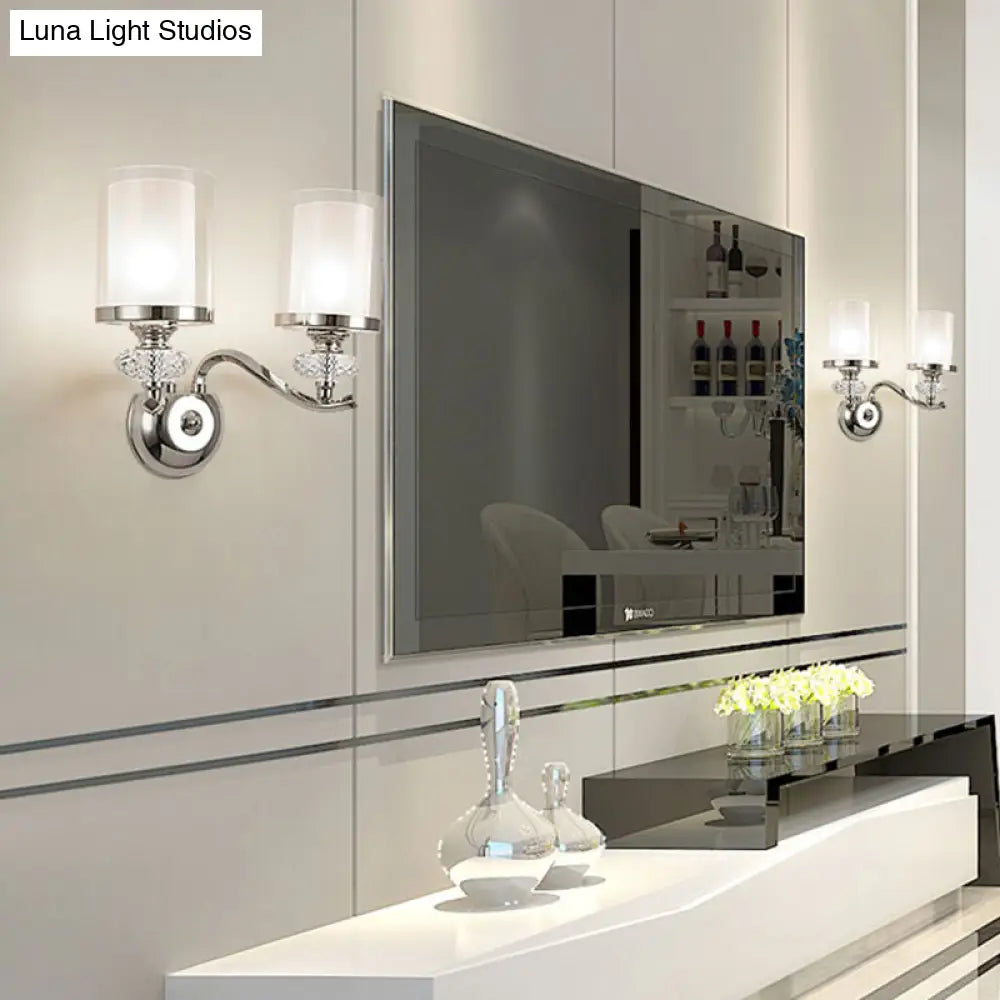 Modern Chrome Dual Cylinder Wall Mount Sconce With Curvy Arm - Simple Bathroom Lighting