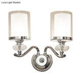 Modern Chrome Dual Cylinder Wall Mount Sconce With Curvy Arm - Simple Bathroom Lighting