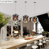 Modern Clear Glass Pendant Ceiling Light with Black Plant Design Inside Black