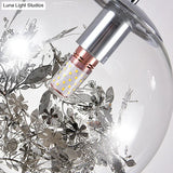 Modern Clear Glass Pendant Ceiling Light with Black Plant Design Inside Black