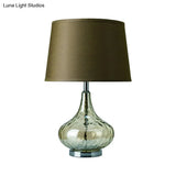 Modern Clear Hammered Glass Bellied Vase Table Lamp With Army Green Fabric Shade