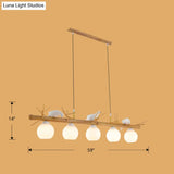 Modern Cream Glass Wood Pendant Light With White Bird Deco - Dome Island Fixture