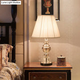 Modern Curved Crystal Task Lamp - Hand-Cut 1-Head 23/25 Length Beige Nightstand Light