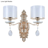 Modern Dual Cylinder 2-Light Gold Wall Sconce With Clear And Frosted Glass