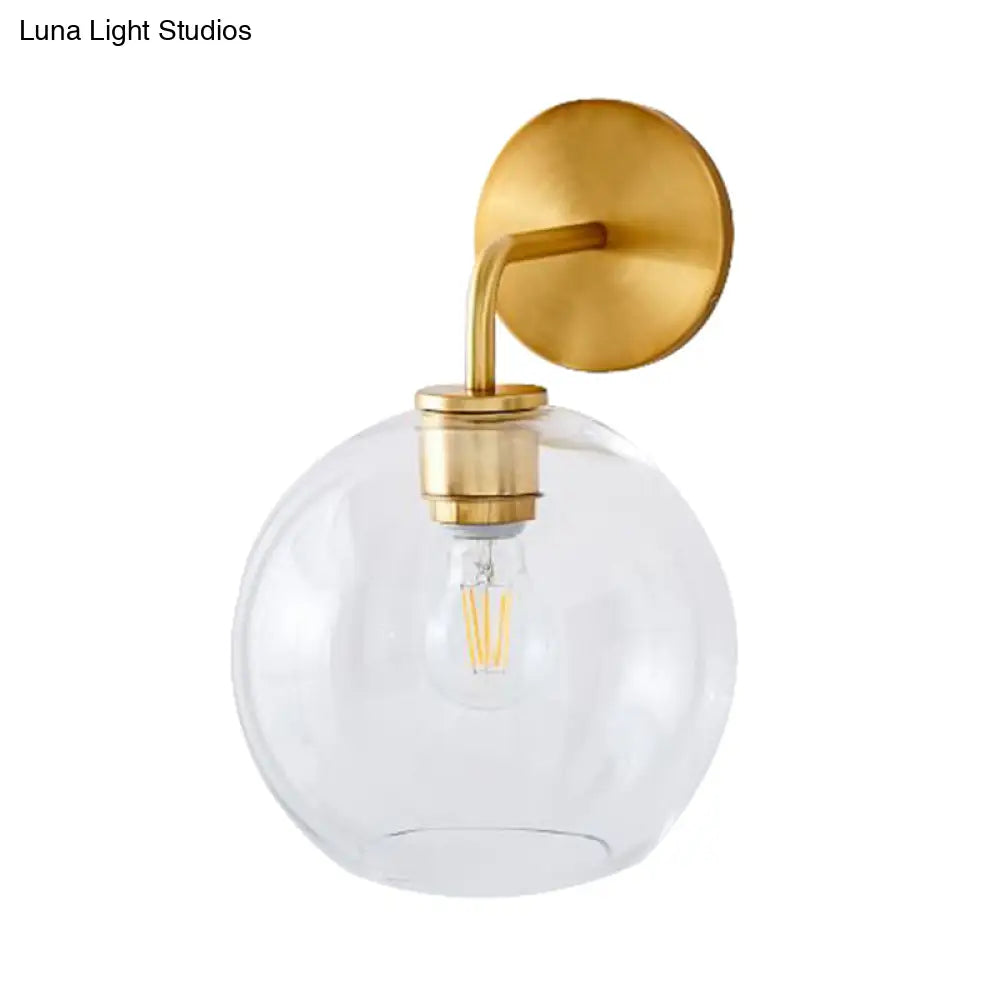 Modern Glass Orb Wall Sconce With Brass Arm Clear/White
