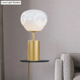 Modern Gold Geometric Nightstand Lamp With Cream Glass Shade - 1 Light Metal Table