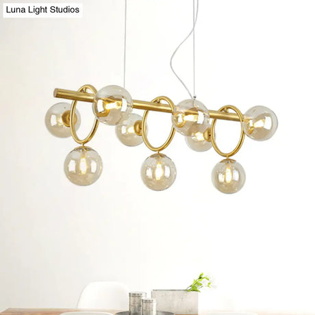 Modern Gold Round Pendant Lighting - 9 Bulb Cognac Glass Led Island Lamp With Linear Design
