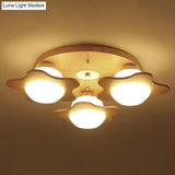 Modern Ivory Glass Flower Ceiling Light With 3 - Head Flush Mount For Bedroom In Wood Finish