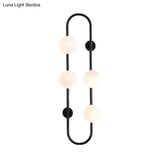 Modern Matte White Glass Globe Wall Sconce With 4-Light Bedroom Lighting Ideas In Black/Gold