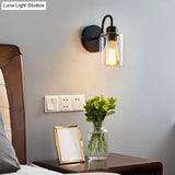 Modern Metal Arm Wall Sconce With Cylinder Glass Shade - Ideal For Bedroom Lighting