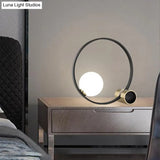 Modern Metal Desk Lamp: Circle Bulb Nightstand Light In Black With Milk Glass Shade