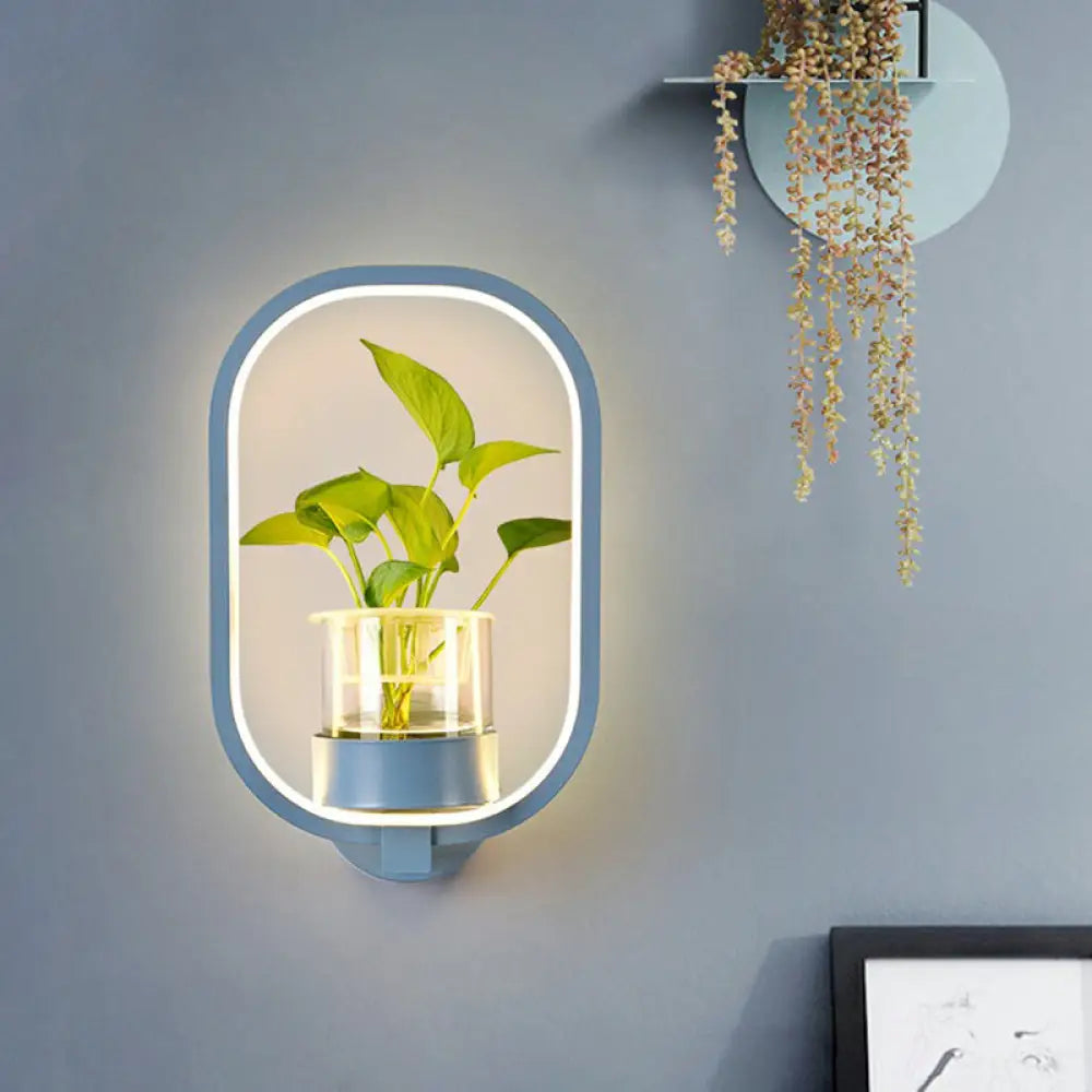 Modern Metal Wall Sconce With Artistic Loop Design And Clear Glass Plant Pot Blue / Third Gear