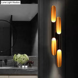 Modern Metallic Cylinder Wall Sconce - Mounted Light For Living Room 1/4-Bulb Yellow-Black Design