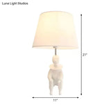 Modern Resin Sitting People Desk Lamp With Tapered Shade - 1 Bulb Light For Kitchen