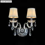 Modern Tapered Sconce Light With 2 Heads - Glass Tube Arm For Bedside Wall Mount