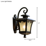 Modern Tetragonal Lotus Wall Sconce In Black Aluminum With Water Glass Shade