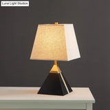 Modern Trapezoid Night Table Lamp In White/Flaxen - Light Fabric Sleek Design With Black Pyramid