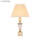 Modern Urn Shape Fabric Desk Light - Faceted Crystal 1 Bulb Night Table Lamp In Beige