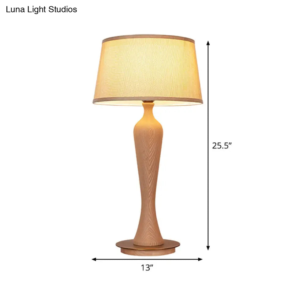 Modern Urn-Shaped Wood Desk Lamp In Beige - 1 Bulb Table Light With Drum Fabric Shade