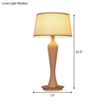 Modern Urn-Shaped Wood Desk Lamp In Beige - 1 Bulb Table Light With Drum Fabric Shade