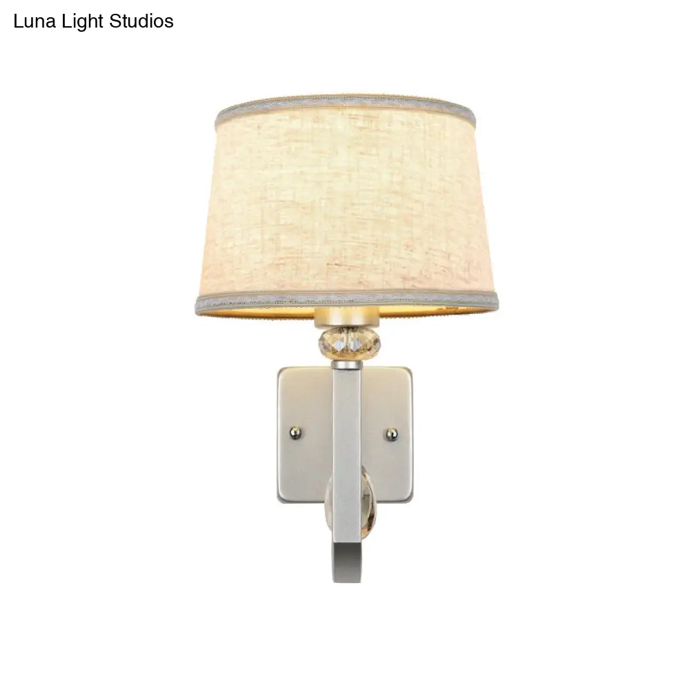 Modern Wall Sconce With Fabric Drum Shade And Silver Metal Backplate
