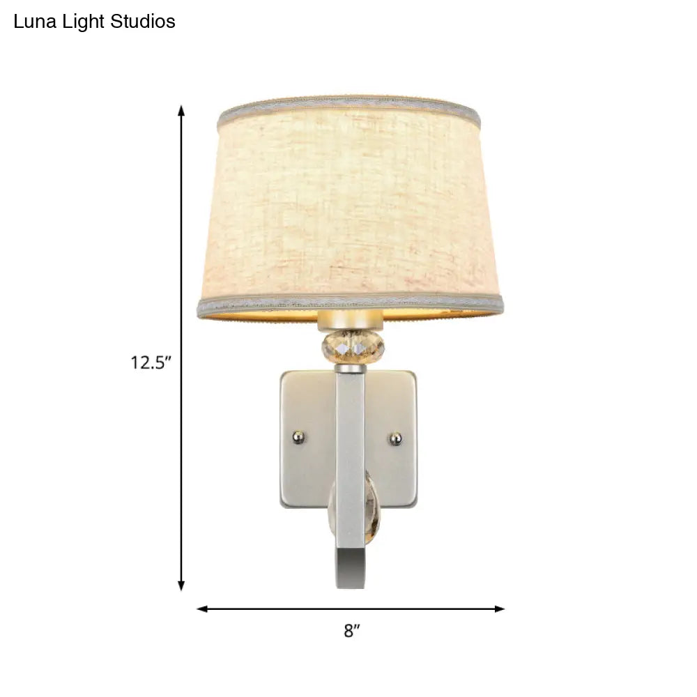 Modern Wall Sconce With Fabric Drum Shade And Silver Metal Backplate