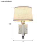 Modern Wall Sconce With Fabric Drum Shade And Silver Metal Backplate