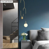 Modern White Glass Sphere Pendant Light With Golden Hanging Fixture For Bedrooms