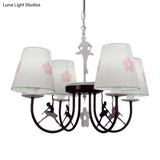 Modern White Hanging Lamp With Floral Accents Perfect For Living Room