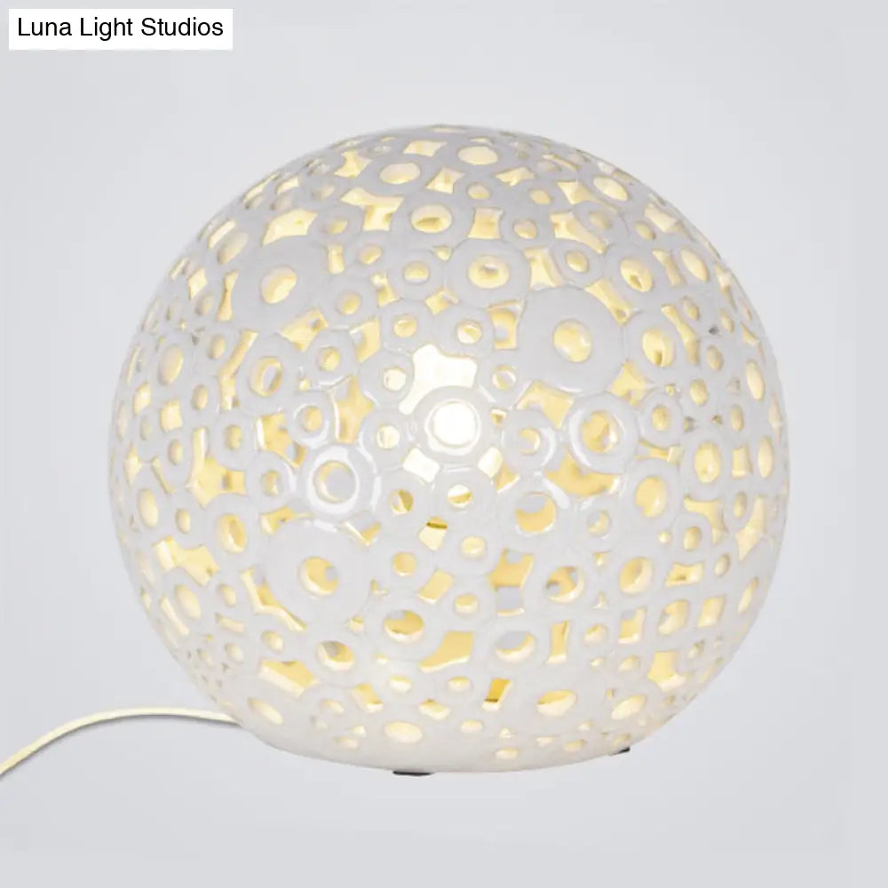 Modern White Hollow-Out Globe Table Light Ceramic Night Lamp For Bedroom