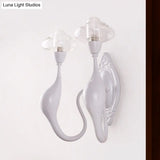 Modern White Led Wall Sconce Light Fixture - Oval Glass Dolphin-Shaped Arm