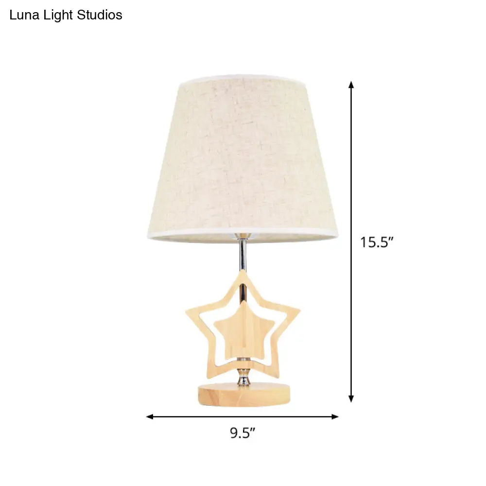 Modern Wood Star Nightstand Lamp With Beige Barrel Fabric Shade